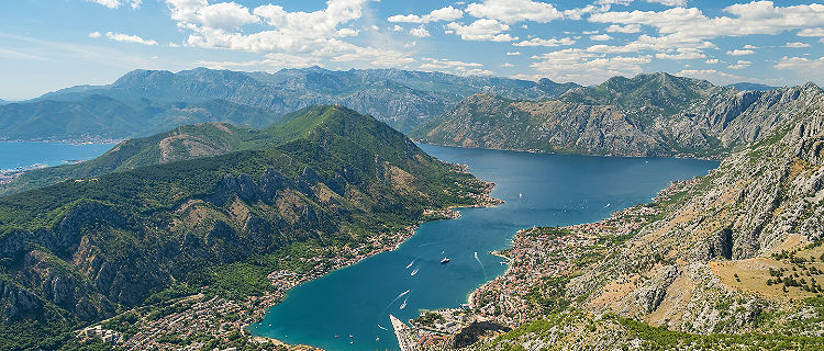 Summer view of the Bay of Kotor in Montenegro. Aerial view from Mount Lovcen Summer view of the Bay of Kotor in Montenegro. Aerial view from Mount Lovcen Summer view of the Bay of Kotor in Montenegro. Aerial view from Mount Lovcen 