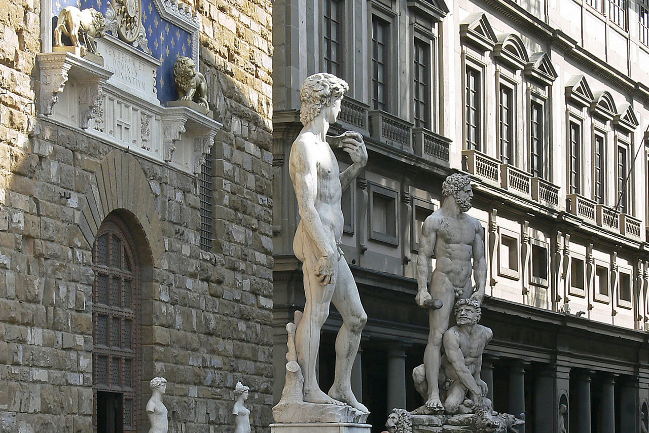 The entrance of the Uffizi Gallery in Florence, Italy with Michelangelo's famous sculpture, David
