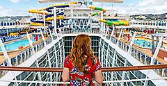 Girl Overlooking the Balcony on Symphony of the Seas 