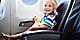 Baby Happy with Stuff Toy in Airplane