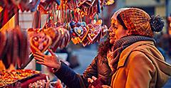Friends shopping for candles in a street market. World Cruise