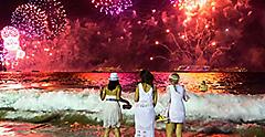 Friends Watching the New Year’s Tradition of Fireworks in Rio de Janeiro, Brazil